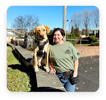 Female trainer with Yellow Lab